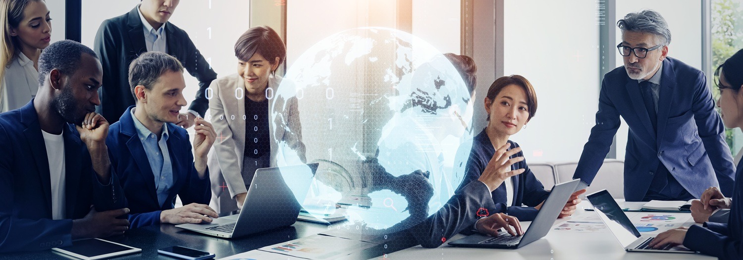 A diverse group of managers representing a global company in a business meeting - PTL Group